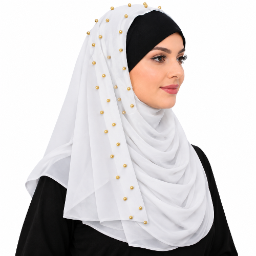 A woman wearing a white hijab with gold bead accents, styled over a black undercap and black clothing, shown against a plain white background.