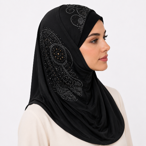 Black rhinestone one piece hijab with sparkling side embellishment worn by a female model on a white background