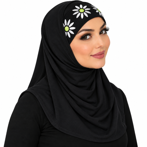 Black two-piece hijab with white floral inner cap and green accents modeled in a normal shoulder-length style on a white background.
