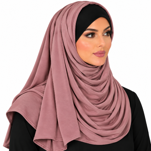 A woman wearing a draped dusty rose hijab over a black under-cap and black top, shown against a plain white background.