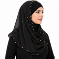 Black chiffon hijab with gold bead details worn by a model