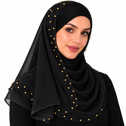Woman wearing a black chiffon hijab scarf with pearl bead details on a white background