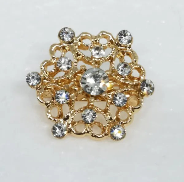 Gold crystal floral hijab brooch pin with rhinestones, decorative flower scarf brooch for securing hijab, elegant modest fashion accessory for scarves and shawls