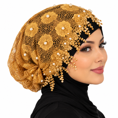Gold pearl lace hijab cap with floral lace and beaded details worn by a model on a white background.