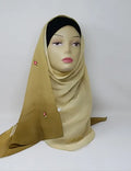 Golden beige chiffon hijab scarf displayed on mannequin, soft warm neutral flowy fabric, lightweight breathable modest headscarf for women, elegant drape chiffon hijab for everyday wear and special occasions, Affordable Hijab USA
