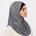 Gray rhinestone one piece hijab with sparkling side embellishment worn by a female model on a white background