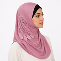 Pink rhinestone one piece hijab with decorative side applique worn by a female model on a white background