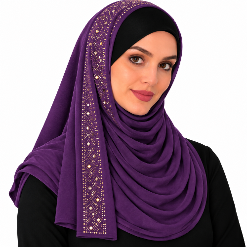 A woman wearing a purple hijab with a decorative border of small gold and white embellishments, styled over a black top against a plain white background.