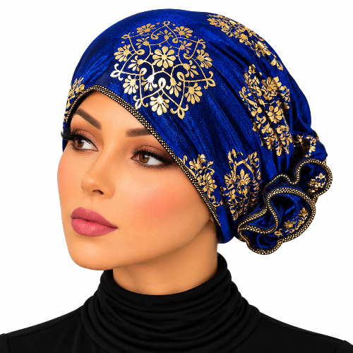 Woman wearing a royal blue turban with elegant gold floral patterns
